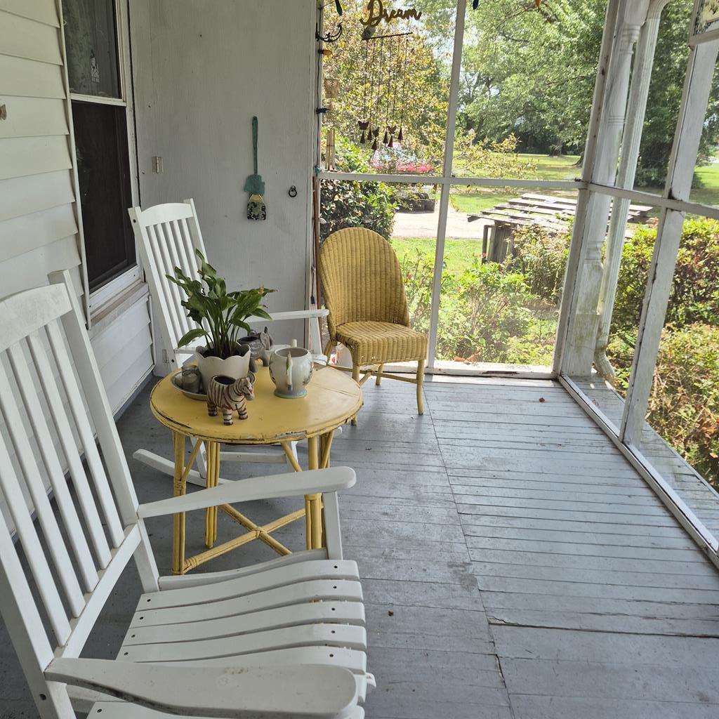 Enjoy coffee on the front porch for additional photo 3